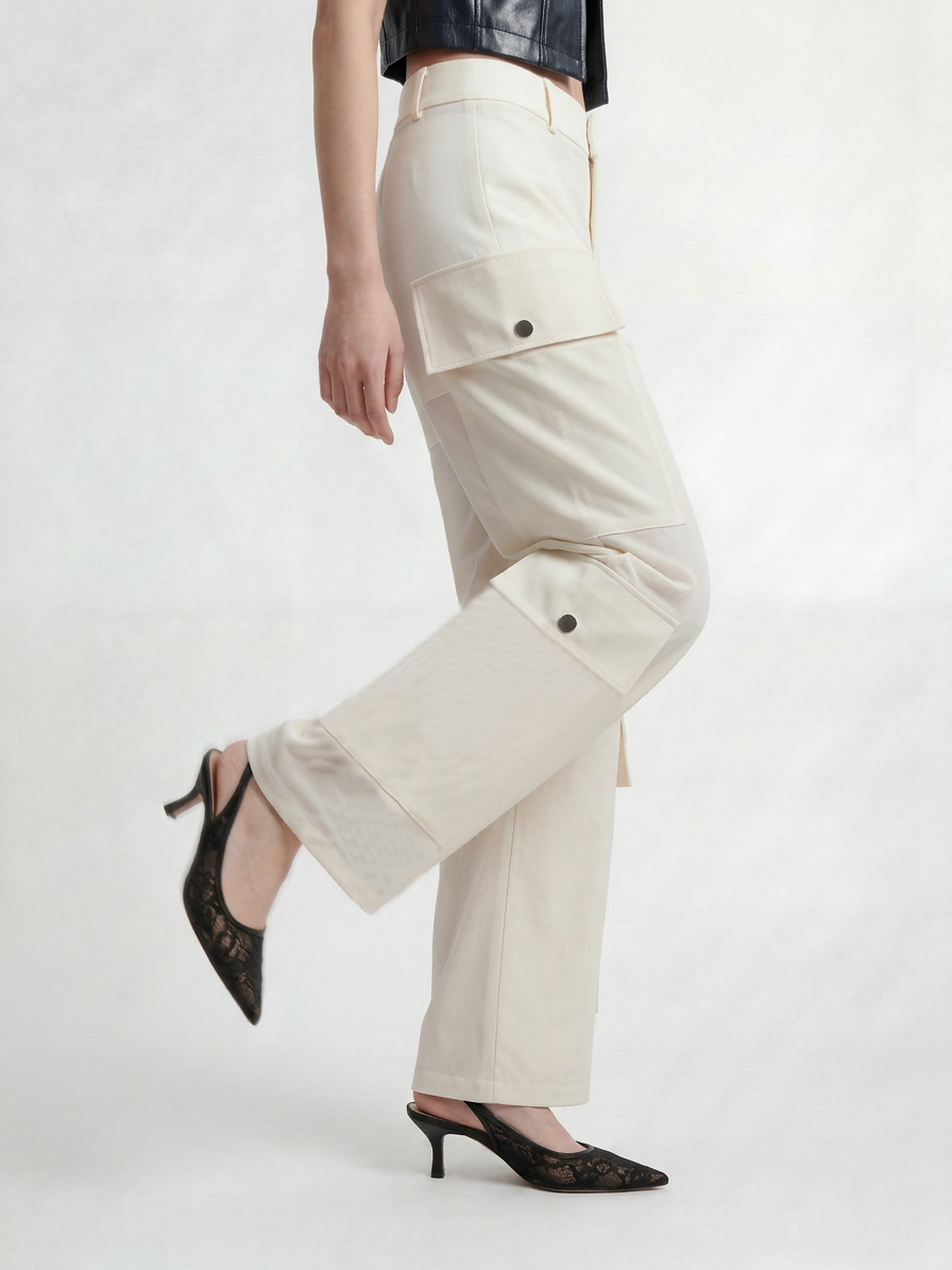 Close-up side view of IL CARGO TRASPARENTE by ORNELLA COLICCHIO with transparent technical fabric and functional cargo pockets